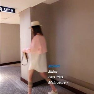 Pink and white shirt skirt.